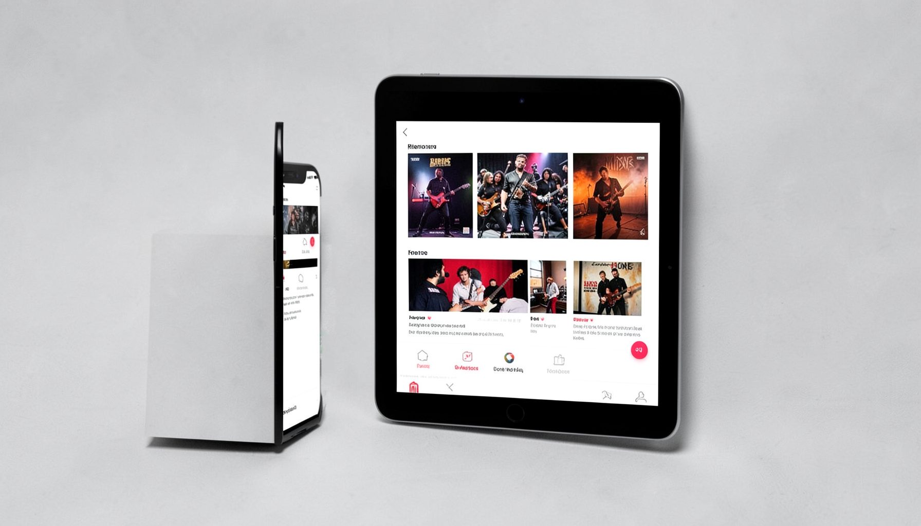 A smartphone and tablet displaying a clean music-store interface with album artwork, set against a light gray desk surface, modern and approachable